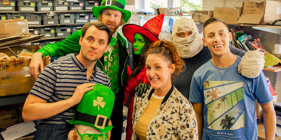 Costume Drama. Image shows from L to R: Shop Owner (Peter Campion), Leprechaun (Jason Byrne), Julie (Karen Hassan), Shop Owner (Bronagh Waugh), Ammon (David Elliott), Michael (Shane Todd). Costume Drama. Image shows from L to R: Shop Owner (Peter Campion), Leprechaun (Jason Byrne), Julie (Karen Hassan), Shop Owner (Bronagh Waugh), Ammon (David Elliott), Michael (Shane Todd).