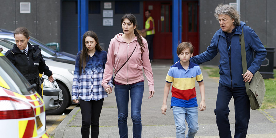 Damned. Image shows from L to R: Unknown, Tiara (Jaime Adler), Elena (Andreea Paduraru), Elena's Son (Andrei Vladut Cociorvan), Al Kavanagh (Alan Davies). Copyright: What Larks Productions. Damned. Image shows from L to R: Unknown, Tiara (Jaime Adler), Elena (Andreea Paduraru), Elena's Son (Andrei Vladut Cociorvan), Al Kavanagh (Alan Davies). Copyright: What Larks Productions.
