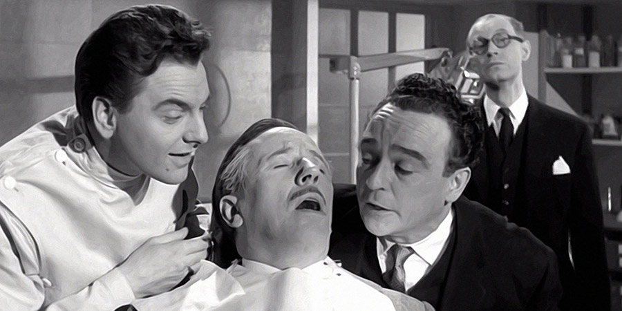 Dentist On The Job. Image shows from L to R: David Cookson (Bob Monkhouse), Mr. Duff (Reginald Beckwith), Sam Field (Kenneth Connor), Macreedy (Richard Wattis). Copyright: Bertram Ostrer Productions. Dentist On The Job. Image shows from L to R: David Cookson (Bob Monkhouse), Mr. Duff (Reginald Beckwith), Sam Field (Kenneth Connor), Macreedy (Richard Wattis). Copyright: Bertram Ostrer Productions.