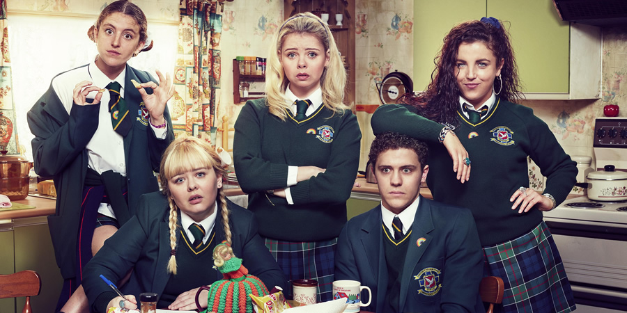Derry Girls. Image shows from L to R: Orla McCool (Louisa Harland), Clare Devlin (Nicola Coughlan), Erin Quinn (Saoirse-Monica Jackson), James Maguire (Dylan Llewellyn), Michelle Mallon (Jamie-Lee O'Donnell). Copyright: Hat Trick Productions. Derry Girls. Image shows from L to R: Orla McCool (Louisa Harland), Clare Devlin (Nicola Coughlan), Erin Quinn (Saoirse-Monica Jackson), James Maguire (Dylan Llewellyn), Michelle Mallon (Jamie-Lee O'Donnell). Copyright: Hat Trick Productions.