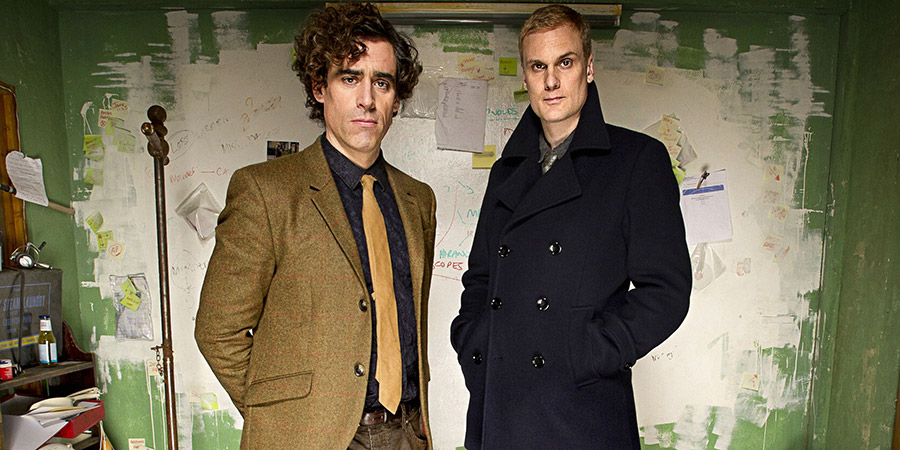 Dirk Gently. Image shows from L to R: Dirk Gently (Stephen Mangan), Richard MacDuff (Darren Boyd). Copyright: The Welded Tandem Picture Company. Dirk Gently. Image shows from L to R: Dirk Gently (Stephen Mangan), Richard MacDuff (Darren Boyd). Copyright: The Welded Tandem Picture Company.