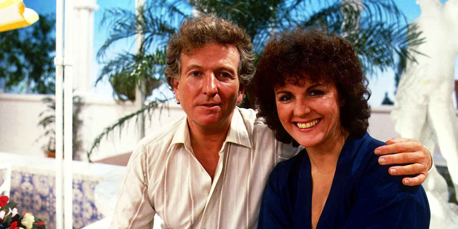 Duty Free. Image shows from L to R: David Pearce (Keith Barron), Amy Pearce (Gwen Taylor). Copyright: Yorkshire Television. Duty Free. Image shows from L to R: David Pearce (Keith Barron), Amy Pearce (Gwen Taylor). Copyright: Yorkshire Television.