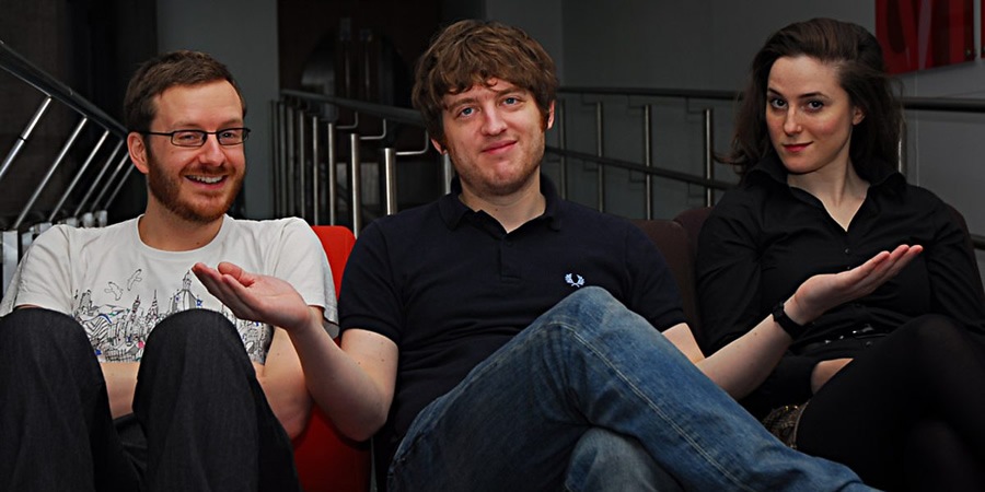 Elis James' Pantheon Of Heroes. Image shows from L to R: Benjamin Partridge, Elis James, Nadia Kamil. Copyright: BBC. Elis James' Pantheon Of Heroes. Image shows from L to R: Benjamin Partridge, Elis James, Nadia Kamil. Copyright: BBC.