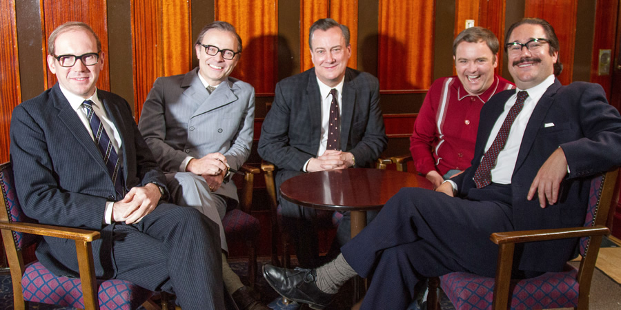 Eric, Ernie And Me. Image shows from L to R: Bill Cotton (Alex Macqueen), Eric Morecambe (Mark Bonnar), Eddie Braben (Stephen Tompkinson), Ernie Wise (Neil Maskell), John Ammonds (Rufus Jones). Copyright: Objective Productions. Eric, Ernie And Me. Image shows from L to R: Bill Cotton (Alex Macqueen), Eric Morecambe (Mark Bonnar), Eddie Braben (Stephen Tompkinson), Ernie Wise (Neil Maskell), John Ammonds (Rufus Jones). Copyright: Objective Productions.