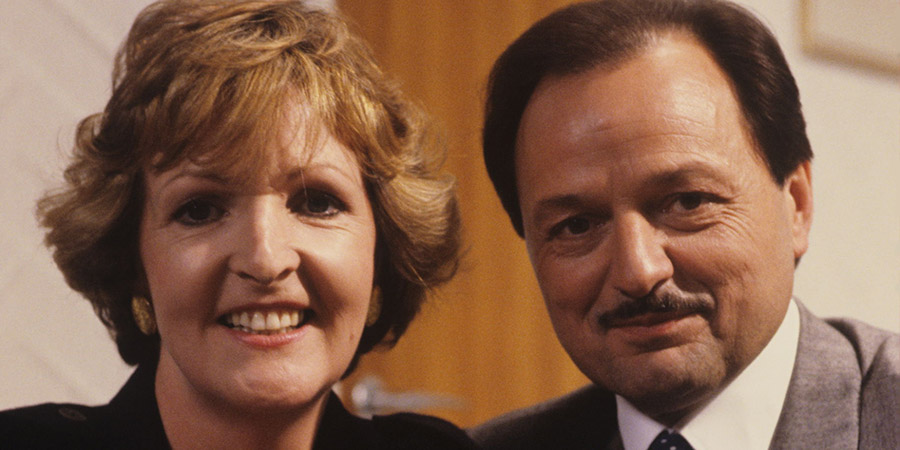 Executive Stress. Image shows from L to R: Caroline Fairchild (Penelope Keith), Donald Fairchild (Peter Bowles). Copyright: Thames Television. Executive Stress. Image shows from L to R: Caroline Fairchild (Penelope Keith), Donald Fairchild (Peter Bowles). Copyright: Thames Television.