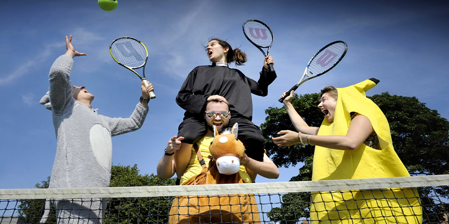 Mixed Doubles playing tennis. Mixed Doubles playing tennis.