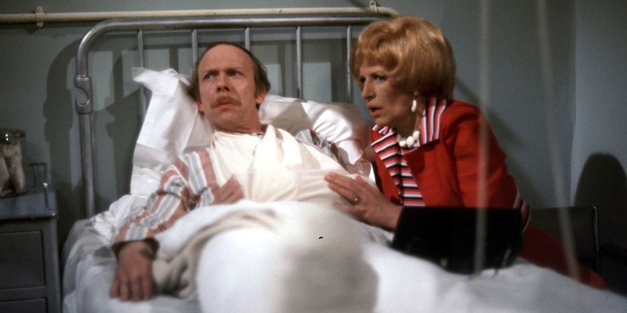 George & Mildred. Image shows from L to R: George Roper (Brian Murphy), Mildred Roper (Yootha Joyce). Copyright: Thames Television. George & Mildred. Image shows from L to R: George Roper (Brian Murphy), Mildred Roper (Yootha Joyce). Copyright: Thames Television.