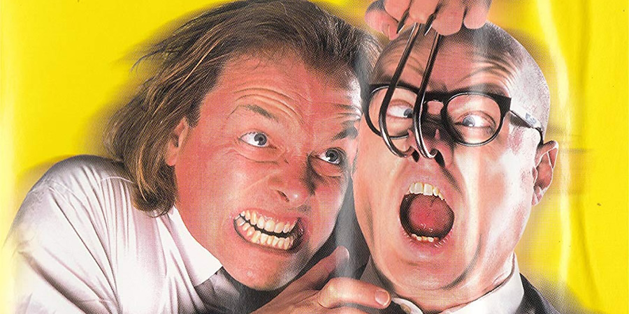 Guest House Paradiso. Image shows from L to R: Richard Twat (Rik Mayall), Eddie Ndingombaba (Adrian Edmondson). Guest House Paradiso. Image shows from L to R: Richard Twat (Rik Mayall), Eddie Ndingombaba (Adrian Edmondson).