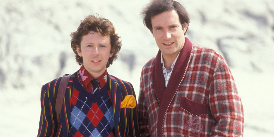 The Hitchhiker's Guide To The Galaxy. Image shows from L to R: Ford Prefect (David Dixon), Arthur Dent (Simon Jones). Copyright: BBC. The Hitchhiker's Guide To The Galaxy. Image shows from L to R: Ford Prefect (David Dixon), Arthur Dent (Simon Jones). Copyright: BBC.