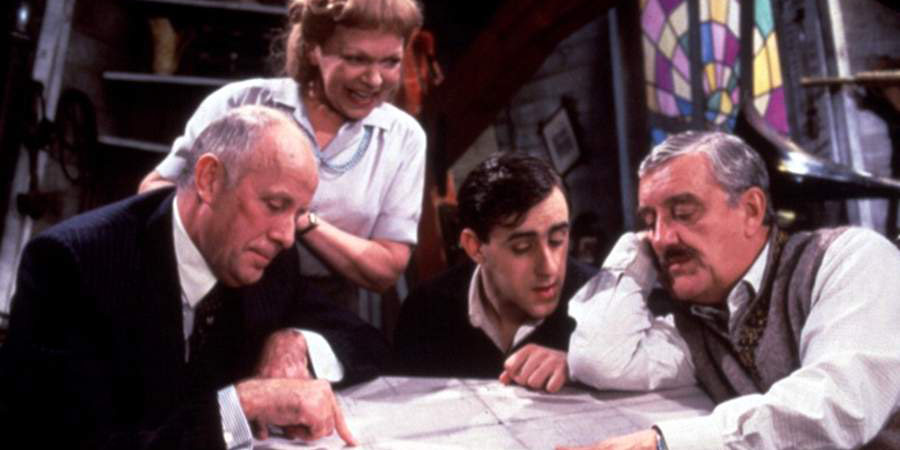 High & Dry. Image shows from L to R: Richard Talbot (Richard Wilson), Miss Baxter (Vivienne Martin), Trevor Archer (Angus Barnett), Ron Archer (Bernard Cribbins). Copyright: Yorkshire Television. High & Dry. Image shows from L to R: Richard Talbot (Richard Wilson), Miss Baxter (Vivienne Martin), Trevor Archer (Angus Barnett), Ron Archer (Bernard Cribbins). Copyright: Yorkshire Television.