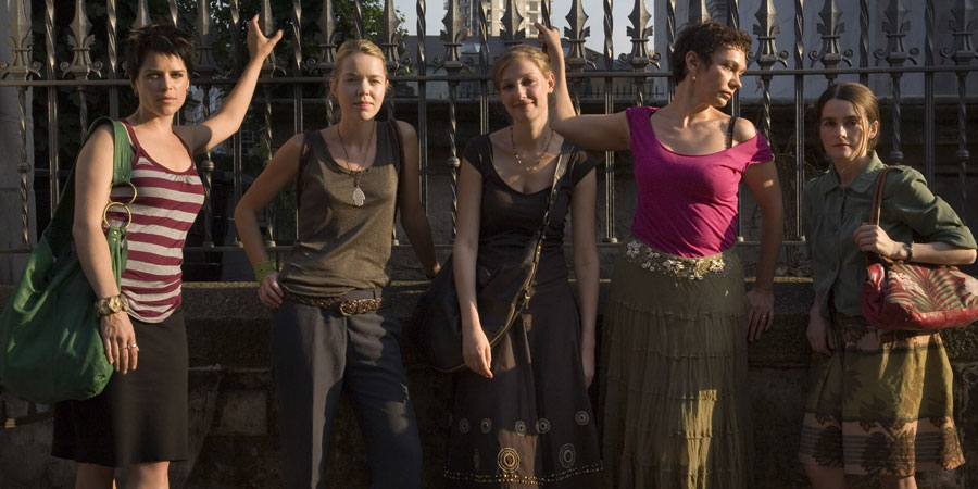 I Really Hate My Job. Image shows from L to R: Abi (Neve Campbell), Madonna (Anna Maxwell Martin), Suzie (Alexandra Maria Lara), Rita (Oana Pellea), Alice (Shirley Henderson). Copyright: 3DD. I Really Hate My Job. Image shows from L to R: Abi (Neve Campbell), Madonna (Anna Maxwell Martin), Suzie (Alexandra Maria Lara), Rita (Oana Pellea), Alice (Shirley Henderson). Copyright: 3DD.