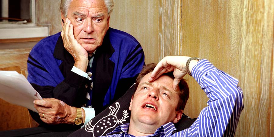 I Think I've Got A Problem. Image shows from L to R: Dr Boone (Bob Monkhouse), Tom Caine (Graham McPherson). Copyright: BBC. I Think I've Got A Problem. Image shows from L to R: Dr Boone (Bob Monkhouse), Tom Caine (Graham McPherson). Copyright: BBC.