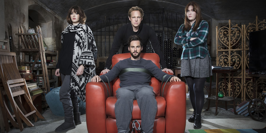 Ill Behaviour. Image shows from L to R: Nadia (Lizzy Caplan), Joel (Chris Geere), Charlie (Tom Riley), Tess (Jessica Regan). Copyright: Fudge Park. Ill Behaviour. Image shows from L to R: Nadia (Lizzy Caplan), Joel (Chris Geere), Charlie (Tom Riley), Tess (Jessica Regan). Copyright: Fudge Park.