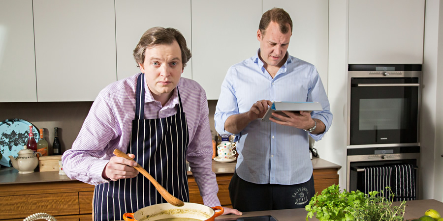 In And Out Of The Kitchen. Image shows from L to R: Damien Trench (Miles Jupp), Anthony McIlvanney (Justin Edwards). Copyright: BBC. In And Out Of The Kitchen. Image shows from L to R: Damien Trench (Miles Jupp), Anthony McIlvanney (Justin Edwards). Copyright: BBC.