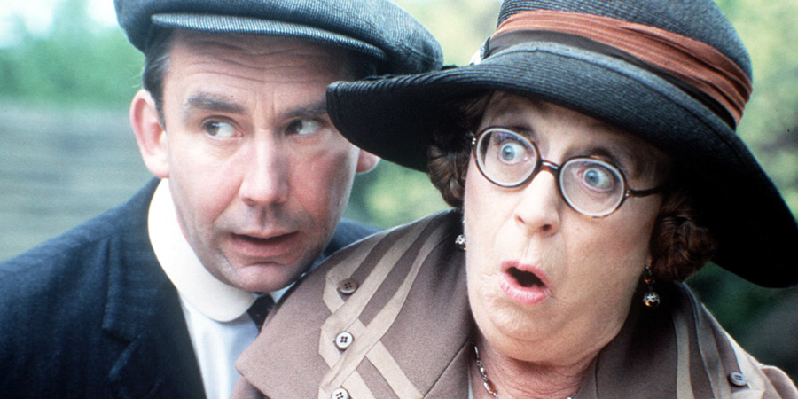 In Loving Memory. Image shows from L to R: Billy Henshaw (Christopher Beeny), Ivy Unsworth (Thora Hird). In Loving Memory. Image shows from L to R: Billy Henshaw (Christopher Beeny), Ivy Unsworth (Thora Hird).