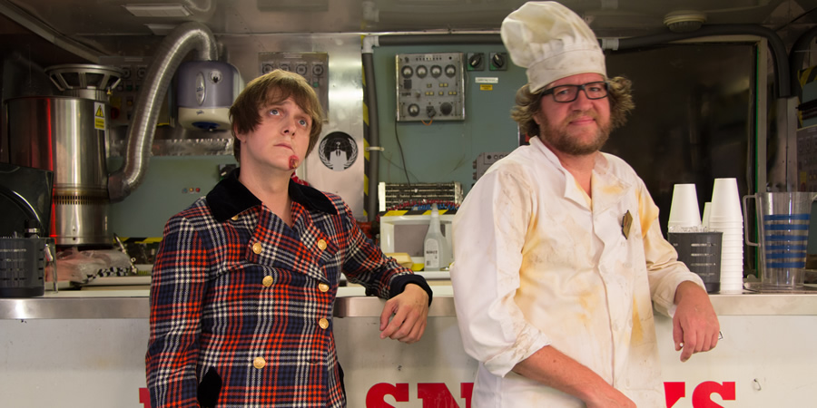Intergalactic Sausage. Image shows from L to R: Joey (Joey Page), John (John Hopkins). Copyright: Wildseed Studios. Intergalactic Sausage. Image shows from L to R: Joey (Joey Page), John (John Hopkins). Copyright: Wildseed Studios.