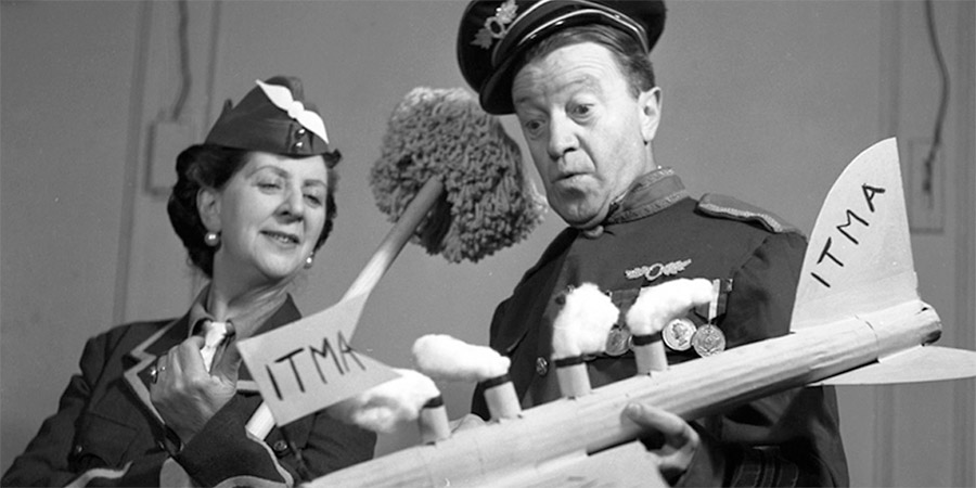 It's That Man Again. Image shows from L to R: Dorothy Summers, Tommy (Tommy Handley). Copyright: BBC. It's That Man Again. Image shows from L to R: Dorothy Summers, Tommy (Tommy Handley). Copyright: BBC.
