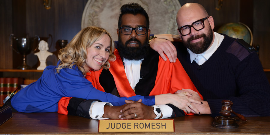 Judge Romesh. Image shows from L to R: Court Clerk (Kerry Howard), Romesh Ranganathan, Court Bailiff (Tom Davis). Copyright: Hungry Bear Media. Judge Romesh. Image shows from L to R: Court Clerk (Kerry Howard), Romesh Ranganathan, Court Bailiff (Tom Davis). Copyright: Hungry Bear Media.
