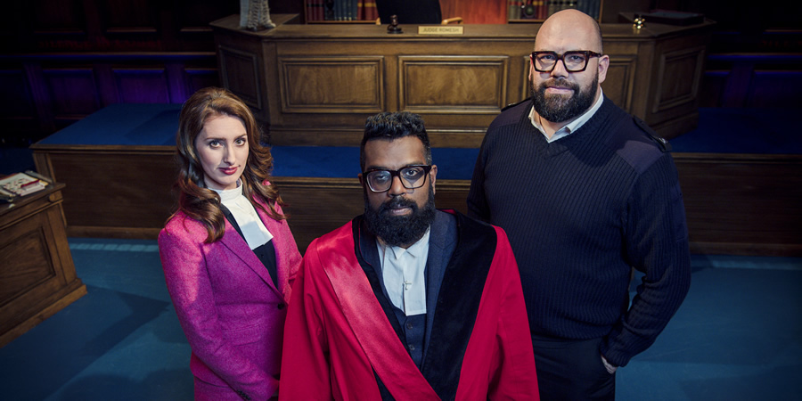 Judge Romesh. Image shows from L to R: Court Clerk (Jessica Knappett), Romesh Ranganathan, Court Bailiff (Tom Davis). Copyright: Hungry Bear Media. Judge Romesh. Image shows from L to R: Court Clerk (Jessica Knappett), Romesh Ranganathan, Court Bailiff (Tom Davis). Copyright: Hungry Bear Media.