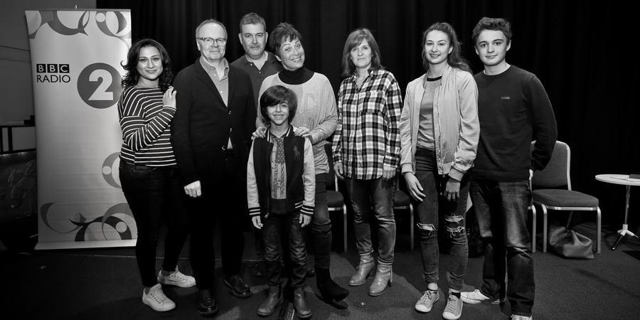Just Grand. Image shows from L to R: Padma (Chetna Pandya), Frank (Jason Watkins), Thommo (Phil Mealey), Gloria (Denise Welch), Marcus (Ben Greaves-Neal), Sandra (Siobhan Finneran), Poppy (Kate Sale), Ollie (Toby Ungelson). Copyright: BBC. Just Grand. Image shows from L to R: Padma (Chetna Pandya), Frank (Jason Watkins), Thommo (Phil Mealey), Gloria (Denise Welch), Marcus (Ben Greaves-Neal), Sandra (Siobhan Finneran), Poppy (Kate Sale), Ollie (Toby Ungelson). Copyright: BBC.