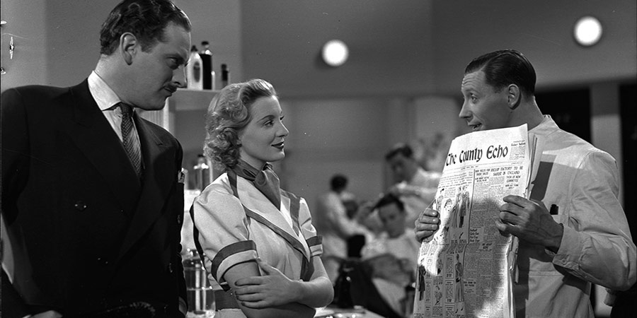 Keep Fit. Image shows from L to R: Hector Kent (Guy Middleton), Joan Allen (Kay Walsh), George Green (George Formby). Copyright: Associated Talking Pictures. Keep Fit. Image shows from L to R: Hector Kent (Guy Middleton), Joan Allen (Kay Walsh), George Green (George Formby). Copyright: Associated Talking Pictures.