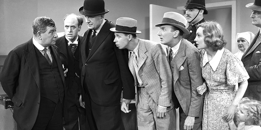 Keep Your Seats, Please!. Image shows from L to R: George Formby, Florence Desmond, Gus McNaughton, Alastair Sim, Binkie Stuart. Copyright: Associated Talking Pictures / STUDIOCANAL. Keep Your Seats, Please!. Image shows from L to R: George Formby, Florence Desmond, Gus McNaughton, Alastair Sim, Binkie Stuart. Copyright: Associated Talking Pictures / STUDIOCANAL.