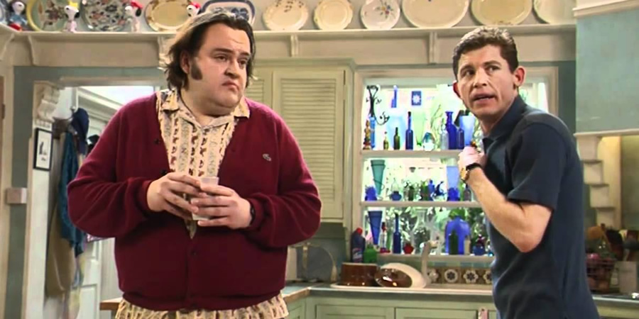 Lee Evans - So What Now?. Image shows from L to R: Stuart (Steven O'Donnell), Lee (Lee Evans). Copyright: Little Mo Films. Lee Evans - So What Now?. Image shows from L to R: Stuart (Steven O'Donnell), Lee (Lee Evans). Copyright: Little Mo Films.