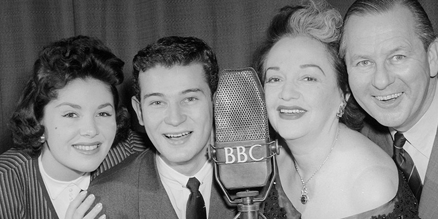 Life With The Lyons. Image shows from L to R: Barbara (Barbara Lyon), Richard (Richard Lyon), Bebe (Bebe Daniels), Ben (Ben Lyon). Copyright: BBC. Life With The Lyons. Image shows from L to R: Barbara (Barbara Lyon), Richard (Richard Lyon), Bebe (Bebe Daniels), Ben (Ben Lyon). Copyright: BBC.