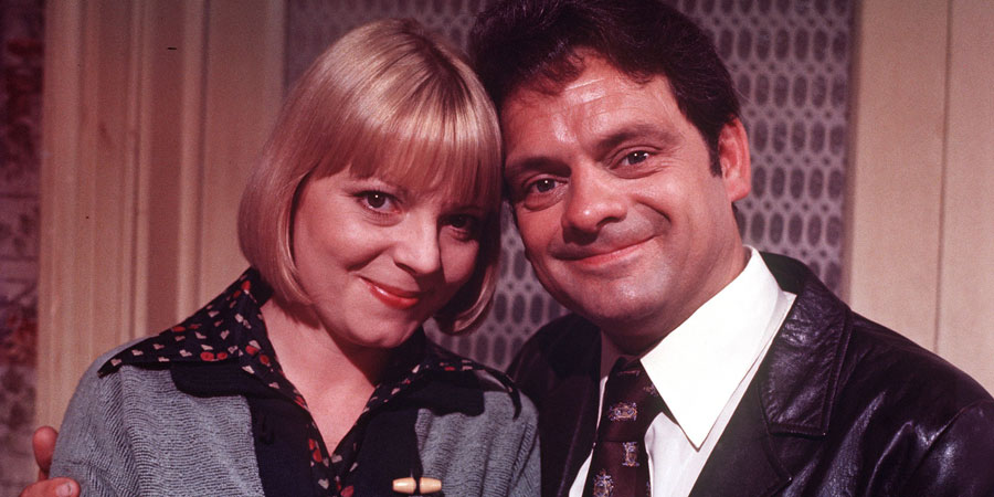 Lucky Feller. Image shows from L to R: Kathleen Peake (Cheryl Hall), Bernard 'Shorty' Mepstead (David Jason). Copyright: London Weekend Television. Lucky Feller. Image shows from L to R: Kathleen Peake (Cheryl Hall), Bernard 'Shorty' Mepstead (David Jason). Copyright: London Weekend Television.