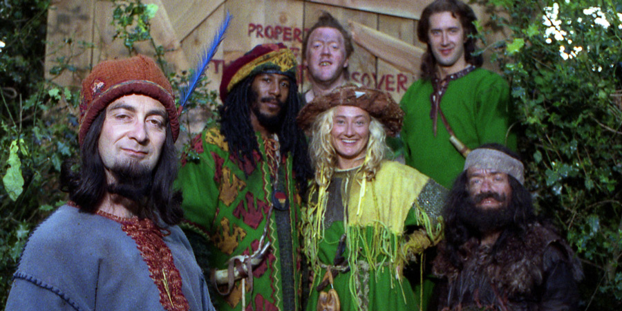 Maid Marian And Her Merry Men. Image shows from L to R: The Sheriff of Nottingham (Tony Robinson), Barrington (Danny John-Jules), Rabies (Howard Lew Lewis), Maid Marian (Kate Lonergan), Robin (Adam Morris), Little Ron (Mike Edmonds). Copyright: BBC. Maid Marian And Her Merry Men. Image shows from L to R: The Sheriff of Nottingham (Tony Robinson), Barrington (Danny John-Jules), Rabies (Howard Lew Lewis), Maid Marian (Kate Lonergan), Robin (Adam Morris), Little Ron (Mike Edmonds). Copyright: BBC.