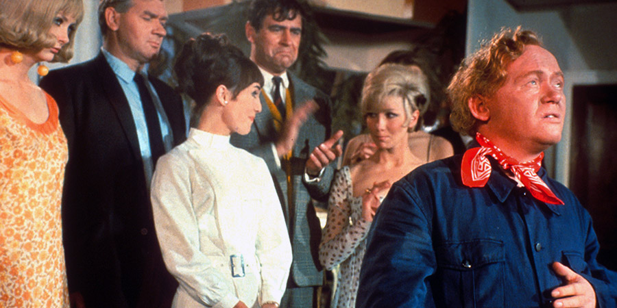 Mister Ten Per Cent. Image shows from L to R: Charlie Drake, George Baker, Una Stubbs, Joyce Blair. Copyright: STUDIOCANAL. Mister Ten Per Cent. Image shows from L to R: Charlie Drake, George Baker, Una Stubbs, Joyce Blair. Copyright: STUDIOCANAL.