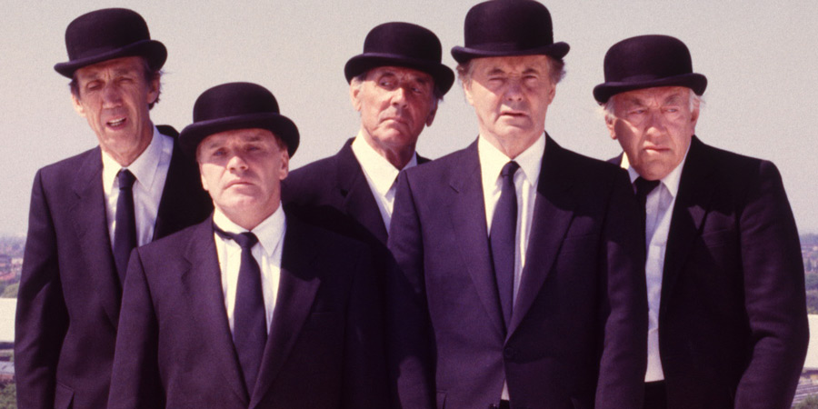 Photograph courtesy of Revelation Films. Image shows from L to R: Dozy Undertaker (Eli Woods), Short Undertaker (Freddie Starr), Senior Undertaker (Eric Sykes), Tall Undertaker (Henry McGee), Elderly Undertaker (Bob Todd). Copyright: Thames Television. Photograph courtesy of Revelation Films. Image shows from L to R: Dozy Undertaker (Eli Woods), Short Undertaker (Freddie Starr), Senior Undertaker (Eric Sykes), Tall Undertaker (Henry McGee), Elderly Undertaker (Bob Todd). Copyright: Thames Television.