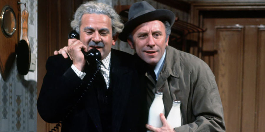 Never Mind The Quality, Feel The Width. Image shows from L to R: Emmanuel 'Manny' Cohen (John Bluthal), Patrick Kelly (Joe Lynch). Copyright: Thames Television / ABC Television. Never Mind The Quality, Feel The Width. Image shows from L to R: Emmanuel 'Manny' Cohen (John Bluthal), Patrick Kelly (Joe Lynch). Copyright: Thames Television / ABC Television.