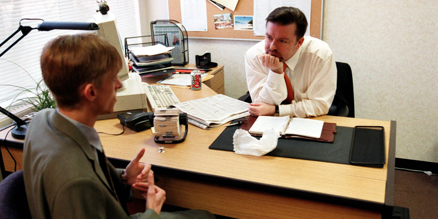 The Office. Image shows from L to R: Gareth Keenan (Mackenzie Crook), David Brent (Ricky Gervais). Copyright: BBC. The Office. Image shows from L to R: Gareth Keenan (Mackenzie Crook), David Brent (Ricky Gervais). Copyright: BBC.