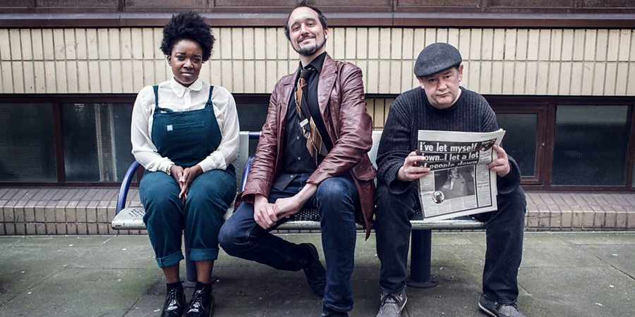 Phil Ellis Is Trying. Image shows from L to R: Lolly (Lolly Adefope), Phil (Phil Ellis), Johnny (Johnny Vegas). Copyright: BBC. Phil Ellis Is Trying. Image shows from L to R: Lolly (Lolly Adefope), Phil (Phil Ellis), Johnny (Johnny Vegas). Copyright: BBC.
