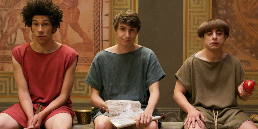 Plebs. Image shows from L to R: Stylax (Joel Fry), Marcus (Tom Rosenthal), Grumio (Ryan Sampson). Copyright: RISE Films. Plebs. Image shows from L to R: Stylax (Joel Fry), Marcus (Tom Rosenthal), Grumio (Ryan Sampson). Copyright: RISE Films.