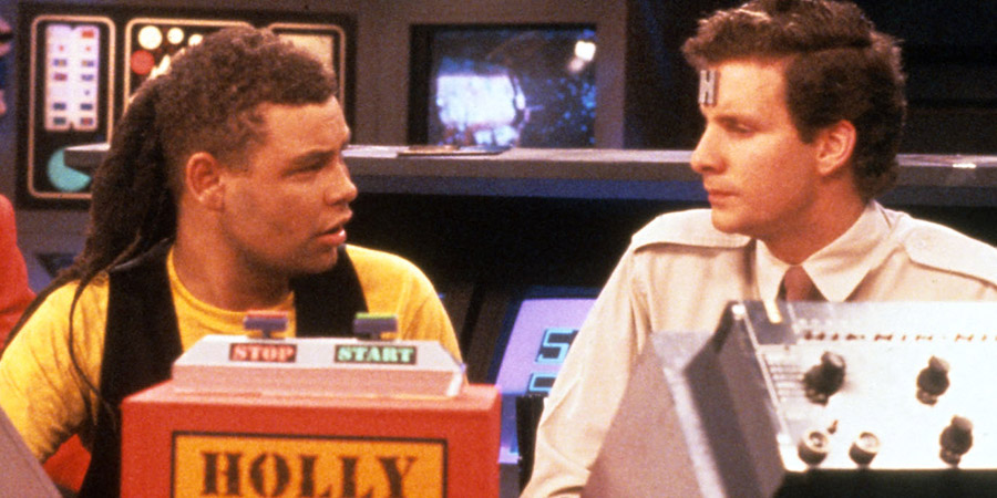 Red Dwarf. Image shows from L to R: Rimmer (Chris Barrie), Lister (Craig Charles). Copyright: BBC. Red Dwarf. Image shows from L to R: Rimmer (Chris Barrie), Lister (Craig Charles). Copyright: BBC.