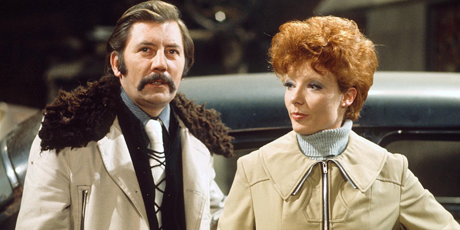 Romany Jones. Image shows from L to R: Bert Jones (James Beck), Betty Jones (Jo Rowbottom). Copyright: London Weekend Television. Romany Jones. Image shows from L to R: Bert Jones (James Beck), Betty Jones (Jo Rowbottom). Copyright: London Weekend Television.