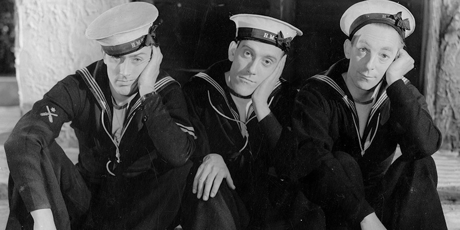 Sailors Three. Image shows from L to R: Johnny (Michael Wilding), Tommy Taylor (Tommy Trinder), Llewellyn 'Admiral' (Claude Hulbert). Copyright: STUDIOCANAL. Sailors Three. Image shows from L to R: Johnny (Michael Wilding), Tommy Taylor (Tommy Trinder), Llewellyn 'Admiral' (Claude Hulbert). Copyright: STUDIOCANAL.