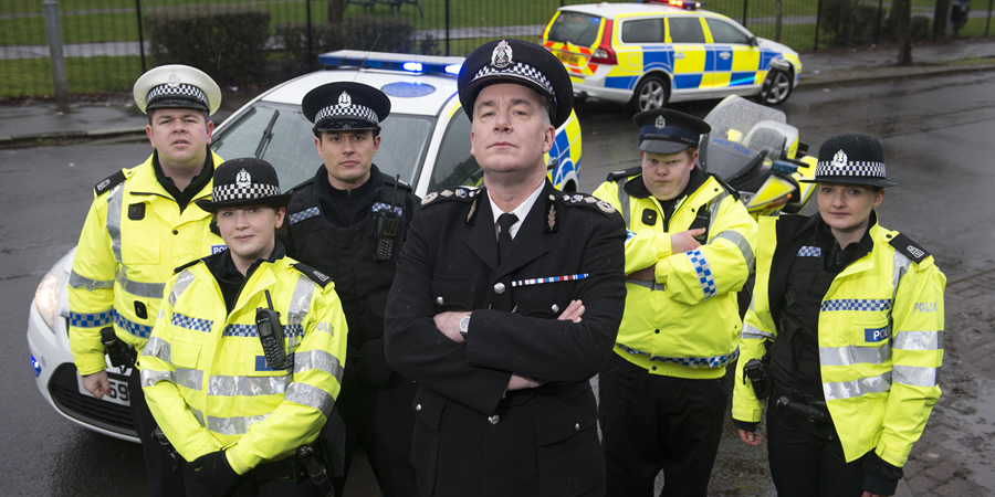 Scot Squad. Image shows from L to R: PC Hugh McKirdy (Graeme Stevely), PC Sarah Fletcher (Sally Reid), PC Jack McLaren (Jordan Young), Chief Commissioner Cameron Miekelson (Jack Docherty), Officer/Acting Sgt. Ken Beattie (James Allenby-Kirk), PC Jane Mackay (Ashley Smith). Scot Squad. Image shows from L to R: PC Hugh McKirdy (Graeme Stevely), PC Sarah Fletcher (Sally Reid), PC Jack McLaren (Jordan Young), Chief Commissioner Cameron Miekelson (Jack Docherty), Officer/Acting Sgt. Ken Beattie (James Allenby-Kirk), PC Jane Mackay (Ashley Smith).