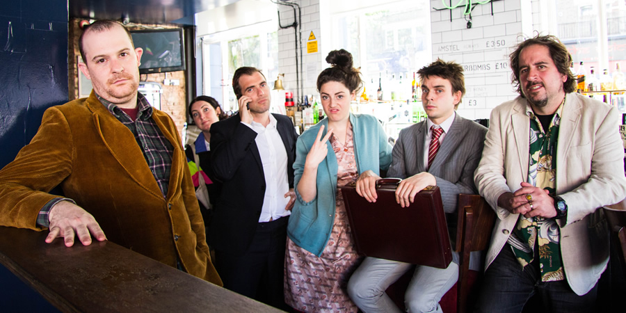 Shambles. Image shows from L to R: Harry (Harry Deansway), Lizzie Johnbags (Cassie Atkinson), Brian Legeite (Jody Kamali), Lex (Tamsyn Kelly), Toby (Joz Norris), Greg (Tony Marrese). Copyright: Wildseed Studios. Shambles. Image shows from L to R: Harry (Harry Deansway), Lizzie Johnbags (Cassie Atkinson), Brian Legeite (Jody Kamali), Lex (Tamsyn Kelly), Toby (Joz Norris), Greg (Tony Marrese). Copyright: Wildseed Studios.