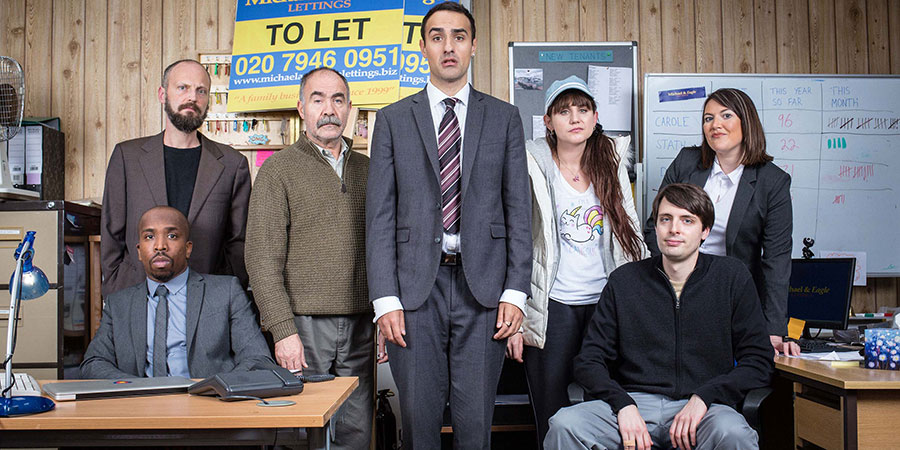 Stath Lets Flats. Image shows from L to R: Dean (Kiell Smith-Bynoe), Marcus (Alex Beckett), Vasos (Christos Stergioglou), Stath (Jamie Demetriou), Sophie (Natasia Demetriou), Al (Alastair Roberts), Carole (Katy Wix). Copyright: Roughcut Television. Stath Lets Flats. Image shows from L to R: Dean (Kiell Smith-Bynoe), Marcus (Alex Beckett), Vasos (Christos Stergioglou), Stath (Jamie Demetriou), Sophie (Natasia Demetriou), Al (Alastair Roberts), Carole (Katy Wix). Copyright: Roughcut Television.