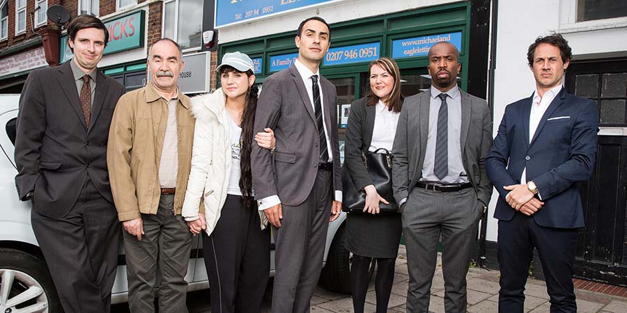 Stath Lets Flats. Image shows from L to R: Al (Alastair Roberts), Vasos (Christos Stergioglou), Sophie (Natasia Demetriou), Stath (Jamie Demetriou), Carole (Katy Wix), Dean (Kiell Smith-Bynoe), Julian (Dustin Demri-Burns). Copyright: Roughcut Television. Stath Lets Flats. Image shows from L to R: Al (Alastair Roberts), Vasos (Christos Stergioglou), Sophie (Natasia Demetriou), Stath (Jamie Demetriou), Carole (Katy Wix), Dean (Kiell Smith-Bynoe), Julian (Dustin Demri-Burns). Copyright: Roughcut Television.
