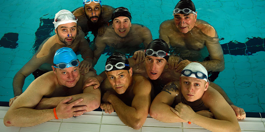 Swimming With Men. Image shows from L to R: Colin (Daniel Mays), New Guy (Ronan Daly), Kurt (Adeel Akhtar), Luke (Rupert Graves), Silent Bob (Chris Jepson), Eric (Rob Brydon), Ted (Jim Carter), Tom (Thomas Turgoose). Copyright: Met Film. Swimming With Men. Image shows from L to R: Colin (Daniel Mays), New Guy (Ronan Daly), Kurt (Adeel Akhtar), Luke (Rupert Graves), Silent Bob (Chris Jepson), Eric (Rob Brydon), Ted (Jim Carter), Tom (Thomas Turgoose). Copyright: Met Film.