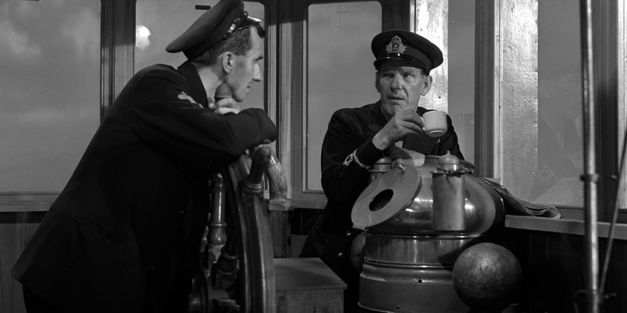 The Big Blockade. Image shows from L to R: Mate (Bernard Miles), Tom, RAF (John Mills). Copyright: Ealing Studios. The Big Blockade. Image shows from L to R: Mate (Bernard Miles), Tom, RAF (John Mills). Copyright: Ealing Studios.