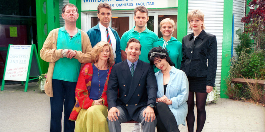 The Brittas Empire. Image shows from L to R: Colin Wetherby (Mike Burns), Helen Brittas (Pippa Haywood), Gavin Featherly (Tim Marriott), Gordon Brittas (Chris Barrie), Tim Whistler (Russell Porter), Carole (Harriet Thorpe), Linda (Jill Greenacre), Julie (Judy Flynn). Copyright: BBC. The Brittas Empire. Image shows from L to R: Colin Wetherby (Mike Burns), Helen Brittas (Pippa Haywood), Gavin Featherly (Tim Marriott), Gordon Brittas (Chris Barrie), Tim Whistler (Russell Porter), Carole (Harriet Thorpe), Linda (Jill Greenacre), Julie (Judy Flynn). Copyright: BBC.