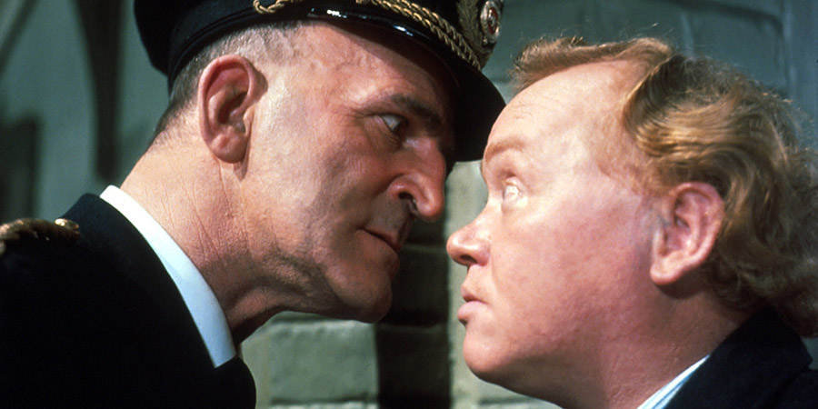 The Cracksman. Image shows from L to R: Chief Prison Officer (Jerold Wells), Ernest Wright (Charlie Drake). Copyright: Associated British Picture Corporation. The Cracksman. Image shows from L to R: Chief Prison Officer (Jerold Wells), Ernest Wright (Charlie Drake). Copyright: Associated British Picture Corporation.