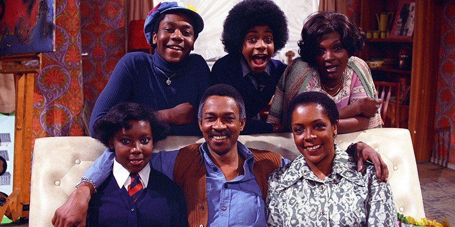 The Fosters. Image shows from L to R: Shirley Foster (Sharon Rosita), Sonny Foster (Lenny Henry), Samuel Foster (Norman Beaton), Benjamin Foster (Lawrie Mark), Pearl Foster (Isabelle Lucas), Vilma (Carmen Munroe). Copyright: London Weekend Television. The Fosters. Image shows from L to R: Shirley Foster (Sharon Rosita), Sonny Foster (Lenny Henry), Samuel Foster (Norman Beaton), Benjamin Foster (Lawrie Mark), Pearl Foster (Isabelle Lucas), Vilma (Carmen Munroe). Copyright: London Weekend Television.