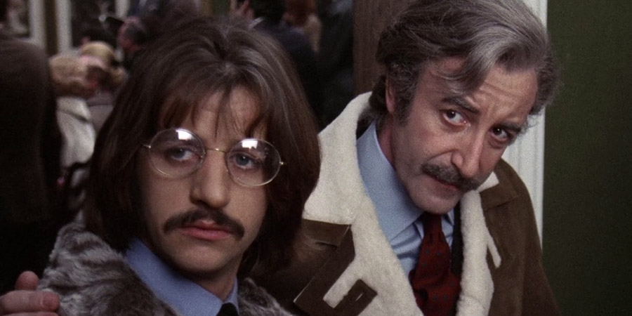 The Magic Christian. Image shows from L to R: Youngman Grand (Ringo Starr), Sir Guy Grand (Peter Sellers). Copyright: Universal Pictures. The Magic Christian. Image shows from L to R: Youngman Grand (Ringo Starr), Sir Guy Grand (Peter Sellers). Copyright: Universal Pictures.
