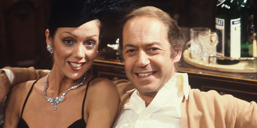 The Other 'Arf. Image shows from L to R: Lorraine Watts (Lorraine Chase), Charles Latimer MP (John Standing). Copyright: ITV. The Other 'Arf. Image shows from L to R: Lorraine Watts (Lorraine Chase), Charles Latimer MP (John Standing). Copyright: ITV.